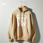 ⁦Baby I Was Born This Way هودي اوفر سايز قطن باللون البيج⁩ - الصورة ⁦2⁩