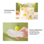 ⁦مج زجاجي للعصائر والمشروبات الدافئة 450 ملي بيد وغطاء سيليكون مع شاليموه باشكال فواكه مختلفة⁩ - الصورة ⁦5⁩