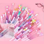 ⁦أقلام جاف جليتر بأشكال ألعاب كرتونية مختلفة⁩ - الصورة ⁦2⁩