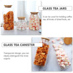 ⁦برطمان بيضاوي لتر زجاج غطاء خشب محكم الغلق لحفظ وتنظيم البقوليات والمكسرات والكورن فليكس والمارشميلو ‏⁩ - الصورة ⁦3⁩