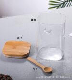 ⁦برطمان زجاج 1 لتر غطاء خشب ومعلقة لحفظ البقوليات والكورن فليكس والمكسرات ‏⁩ - الصورة ⁦2⁩