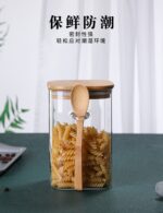 ⁦برطمان زجاج 1 لتر غطاء خشب ومعلقة لحفظ البقوليات والكورن فليكس والمكسرات ‏⁩ - الصورة ⁦6⁩