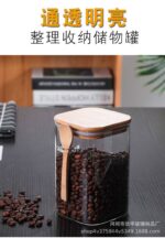 ⁦برطمان زجاج 1 لتر غطاء خشب ومعلقة لحفظ البقوليات والكورن فليكس والمكسرات ‏⁩ - الصورة ⁦7⁩