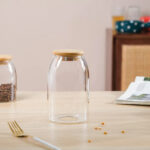 ⁦برطمان زجاج  700ملي غطاء خشب محكم الغلق لحفظ وتنظيم البقوليات والتوابل والمكسرات والكورن فليكس ‏⁩ - الصورة ⁦5⁩