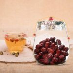 ⁦برطمان زجاج شفاف 700 ملي لحفظ البقوليات والمكسرات والكاندي بغطاء محكم الغلق مزين بقماش منقوش ورد⁩ - الصورة ⁦7⁩