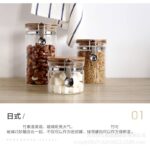 ⁦برطمان زجاج غطاء خشب بقفل 450 ملي لحفظ وتنظيم التوابل والمكسرات والبقوليات ‏⁩ - الصورة ⁦4⁩