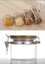 ⁦برطمان زجاج غطاء خشب بقفل 450 ملي لحفظ وتنظيم التوابل والمكسرات والبقوليات ‏⁩ - الصورة ⁦8⁩