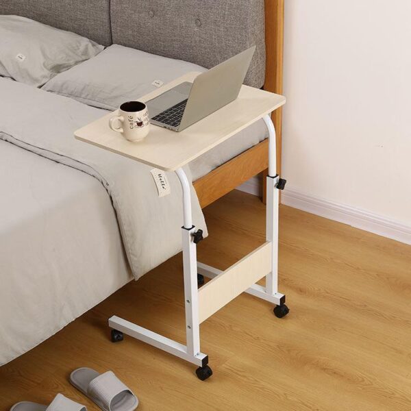 ترابيزة خشب بأرجل معدنية وعجلات لسهولة الحركة مناسبة للاب توب وتناول الطعام