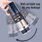 ⁦ترمس حراري محمول استانليس ستيل 1000 ملي بغطاء محكم الغلق و مصفاه للسفر والرحلات والتخييم⁩ - الصورة ⁦3⁩