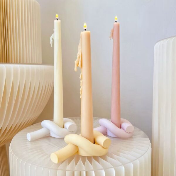 حامل شموع هاند ميد شكل عقدة من الجبس لتجديد وتغير ديكور البيت