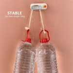 ⁦حامل ومنظم مكانس فردي من السيليكون يثبت علي الحائط بلزق دبل فيس قوي⁩ - الصورة ⁦7⁩