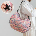 شنطة تسوق وسفر جامبو لحمل جميع المشتريات والمتعلقات قابلة للطي بيد لسهولة الحمل باشكال مختلفة