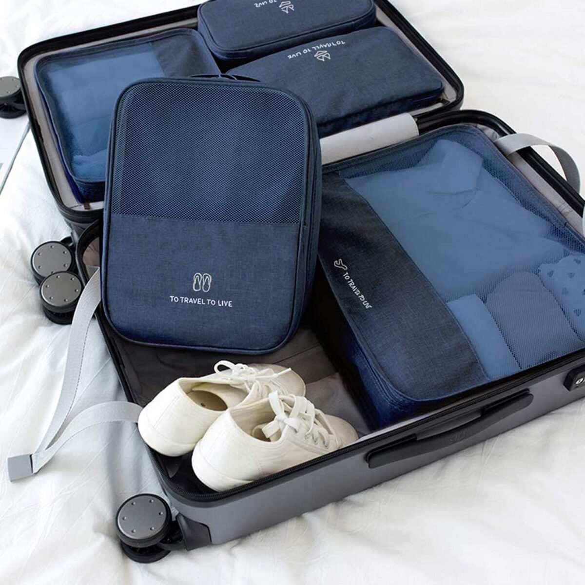 ⁦شنطة منظم للاحذية وتربروف كبيرة تحمل 3 ازواج بيد تعلق علي حقائب السفر لسهولة التحرك⁩ - الصورة ⁦5⁩