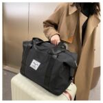 ⁦شنطة وتربروف بجزء للتعليق في يد شنط السفر قابلة للطي كبيرة لتسع كافة المتعلقات الشخصية بجيوب خارجية⁩ - الصورة ⁦8⁩