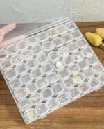 ⁦صندوق منظم وحامل للاكسسورات والادوية 56 فتحة مقسم مجموعات قابلة للفصل لسهولة الحمل في الشنط وقت الخروج والسفر⁩ - الصورة ⁦3⁩