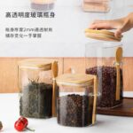 ⁦طقم برطمانات زجاج 3 قطع معالق خشب‎ ‎مقاسات مختلفه ‏لحفظ الشاي والسكر والقهوة والنسكافيه والتوابل⁩ - الصورة ⁦7⁩