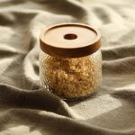 ⁦طقم برطمانات زجاج مزرقش3 قطع باحجام مختلفة لحفظ وتخزين الحبوب والبقوليات والتوابل بغطاء خشبي⁩ - الصورة ⁦4⁩