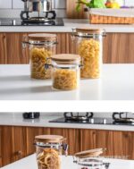 ⁦طقم برطمانات زجاجي 3 قطع احجام مختلفة بغطاء خشبي محكم الغلق لحفظ وتخزين الشاي والسكر والحبوب والبقوليات⁩ - الصورة ⁦3⁩