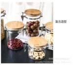 ⁦طقم برطمانات زجاجي 3 قطع احجام مختلفة بغطاء خشبي محكم الغلق لحفظ وتخزين الشاي والسكر والحبوب والبقوليات⁩ - الصورة ⁦4⁩