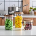 ⁦طقم برطمانات زجاجي 3 قطع احجام مختلفة بغطاء خشبي محكم الغلق لحفظ وتخزين الشاي والسكر والحبوب والبقوليات⁩ - الصورة ⁦7⁩