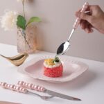 ⁦طقم تقديم طعام 4 قطع معلقتين بمقاس مختلف وشوكة وسكينة بمقبض سيراميك شكل بابلز باللون البينك⁩ - الصورة ⁦2⁩