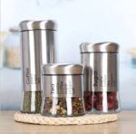 ⁦طقم توابل 3 قطع بمقاسات مختلفة لحفظ وتنظيم الفلفل والملح والشطة من الزجاج والاستانليس⁩ - الصورة ⁦3⁩
