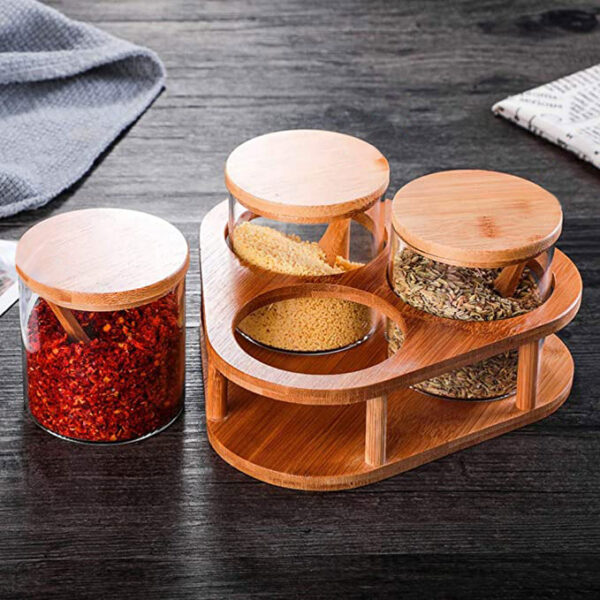 طقم توابل زجاج انيق  3 قطع بحامل خشبي يدور 360 درجة وغطاء محكم الغلق