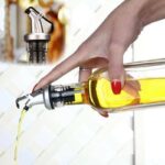 ⁦طقم زجاجات للزيت والخل والصوصات والعسل قطعتين من الزجاج 500 ملي⁩ - الصورة ⁦11⁩