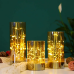 ⁦طقم شمع زجاجي 3 قطع بمقاسات مختلفة مضئ بدون لهب ببطاريات لتجديد ديكور البيت⁩ - الصورة ⁦2⁩