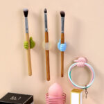 ⁦ماسك منظم للشواحن والأسلاك والفرش كف يد سيليكون ١٠ قطع⁩ - الصورة ⁦2⁩