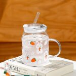 ⁦مج ارنوب زجاجي 400 ملي بشالميوه لسهولة الشرب للمشروبات الباردة والساخنة بيد⁩ - الصورة ⁦3⁩