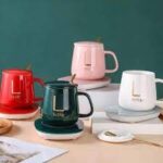 ⁦مج بورسلين قاعدة سخان كهرباء وغطاء ومعلقة للأستمتاع بالقهوة والمشروبات دافئة طول اليوم⁩ - الصورة ⁦9⁩