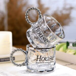 ⁦مج هاوس 250 ملي زجاج شفاف بيد شكل لولي باللون الفضي لشرب وتقديم الشاي والنسكافيه للضيوف بشكل شيك⁩ - الصورة ⁦2⁩