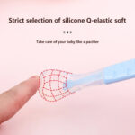 ⁦معلقة أطفال 2 في 1 جزء سيليكون وأخر استانليس لتناول الأطعمة السائلة وكشط الفواكه والخضروات⁩ - الصورة ⁦6⁩