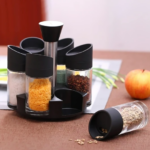 ⁦طقم توابل 6 قطع مع حامل يدور 360 درجة لسهولة الأختيار والأستخدام⁩ - الصورة ⁦2⁩