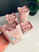 ⁦طقم علب اكليريك 4 قطع بمقاسات مختلفة لحفظ وتنظيم البقوليات والحبوب والكاندي بغطاء محكم الغلق بيد⁩ - الصورة ⁦7⁩