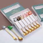 طقم معالق استانليس ستيل مطلي باللون الجولد 6 قطع بأشكال كرتونيه مختلفة