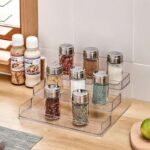 ⁦منظم اكليريك متدرج 3 دور لحمل وتنظيم زجاجات الزيت وبرطمانات التوابل وادوات الميكب والعناية بالشعر والبشرة⁩ - الصورة ⁦6⁩