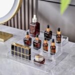 ⁦منظم اكليريك متدرج 3 دور لحمل وتنظيم زجاجات الزيت وبرطمانات التوابل وادوات الميكب والعناية بالشعر والبشرة⁩ - الصورة ⁦8⁩