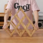 ⁦استاند خشب مقسم 6 خانات قابل للطي لحمل وتنظيم زجاجات المياة والعصائر⁩ - الصورة ⁦3⁩