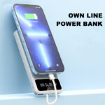 ⁦باور بانك 2*1 بشاشة ديجيتال و كشاف لشحن اربع اجهزة في وقت واحد بلصق مطاطي لتثبيته علي الموبايل 10000 ملي امبير⁩ - الصورة ⁦7⁩