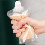 ⁦كيس 30 ملي لحمل الشامبو والشاور جل والكريمات للسفر والرحلات قابل لإعادة الملئ⁩ - الصورة ⁦3⁩