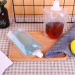 ⁦كيس 30 ملي لحمل الشامبو والشاور جل والكريمات للسفر والرحلات قابل لإعادة الملئ⁩ - الصورة ⁦7⁩