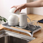 مصفاة بلاستيك 2*1 قابلة للفك و التركيب لتصفية الاطباق و الاكواب  بفتحة لتصريف المياه بسهولة