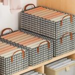 ⁦منظم ملابس للدواليب والادراج بيد قابل للطي⁩ - الصورة ⁦2⁩