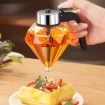 ⁦موزع للعسل 200 ملي علي شكل خلية نحل اكليريك⁩ - الصورة ⁦8⁩