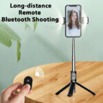 ⁦سيلفي ستيك دوار مع ترايبود قابل للتمدد واضاءة للتصوير يعمل بالبلوتوث⁩ - الصورة ⁦3⁩