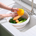 ⁦باسكت غسيل سيليكون دائري الشكل قابل للطي وبيد لسهولة الحمل⁩ - الصورة ⁦2⁩