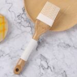 ⁦طقم توزيع سيليكون بيد خشب 4 قطع⁩ - الصورة ⁦2⁩