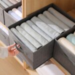 منظم ملابس مقسم ل 8 خانات لتنظيم الملابس داخل الادارج والدواليب قابل للطي